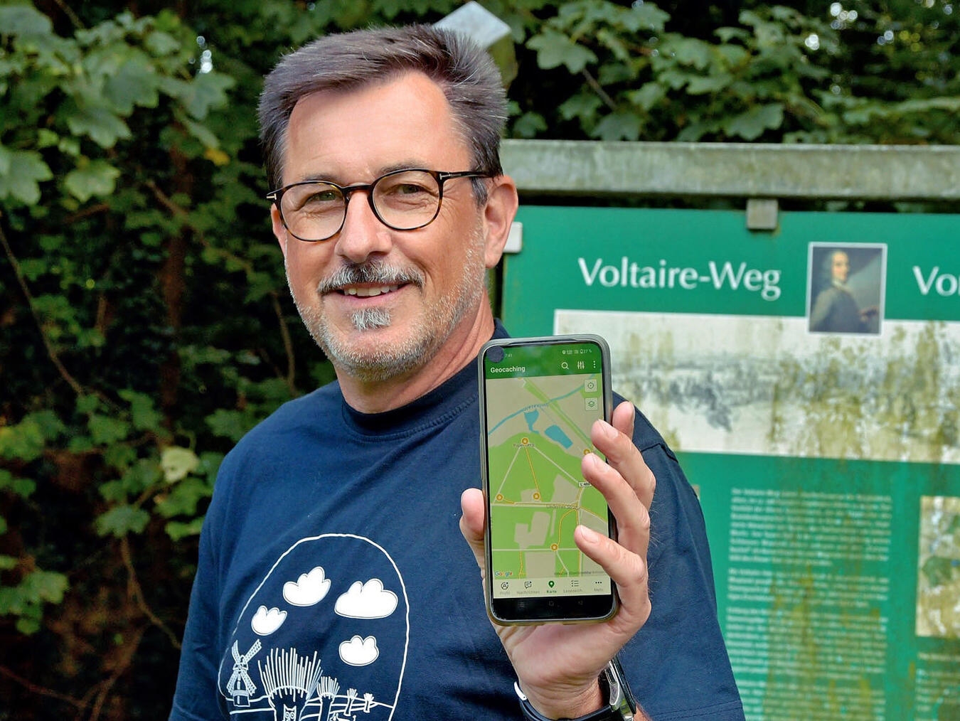 Achim Matenaar, Organisator der Rheinkippenwoche in Emmerich-Rees, lächelnd im Freien.