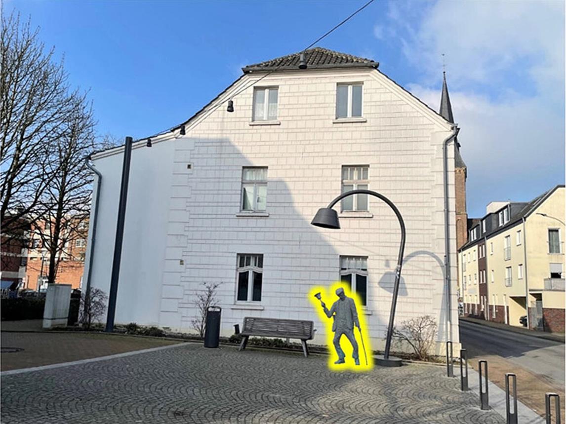 Die Bronze-Statue soll mitten im Alpener Ortskern aufgestellt werden. Fotomontage: Gemeinde Alpen