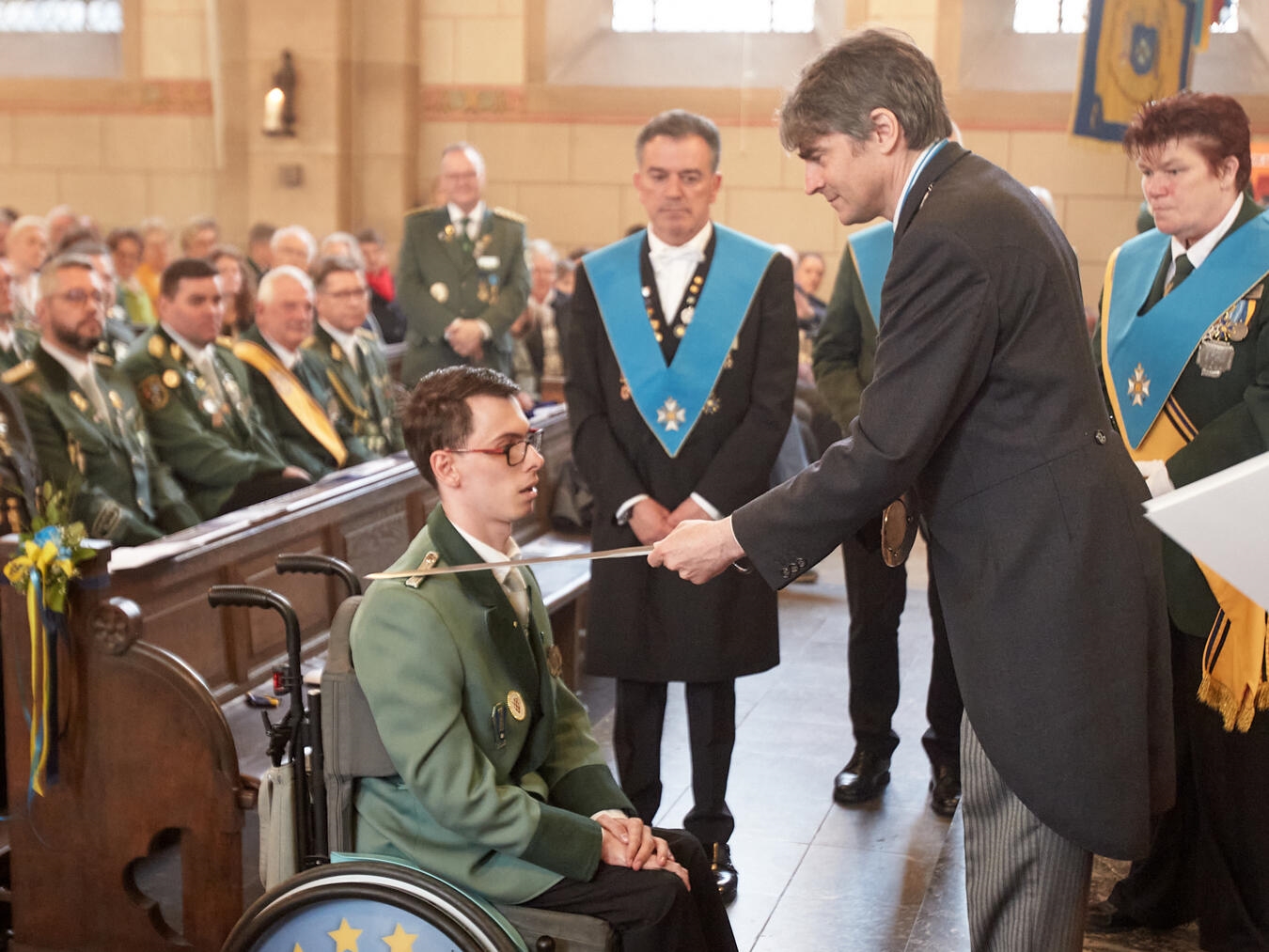 "Maurice Ratajczak beim Ritterschlag durch EGS-Präsident Albert-Henri Prinz de Merode, Foto von TobiasHerbstMedia"