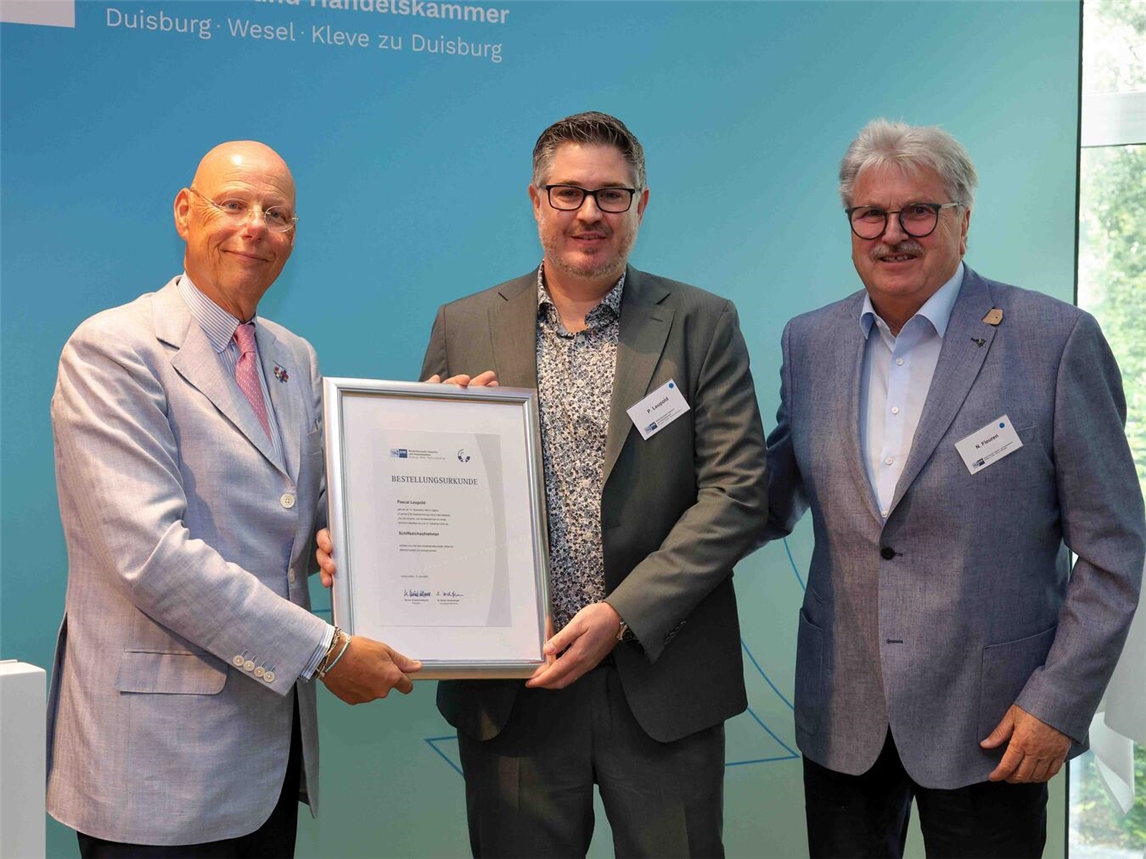Präsident Werner Schaurte-Küppers mit Pascal Leupold und Norbert Fleuren bei IHK-Veranstaltung.